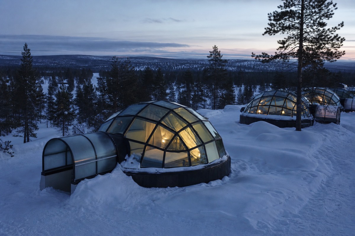Glass igloos on the snow at a Saariselkä-area resort, Finnish Lapland